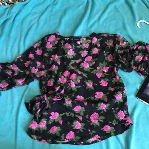 Wrap around black flowered shirt